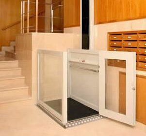 HDP-1 - Elevador de corto recorrido de diseño robusto con capacidad de carga de 300 kg y velocidad de elevación de 0,10 m/s.